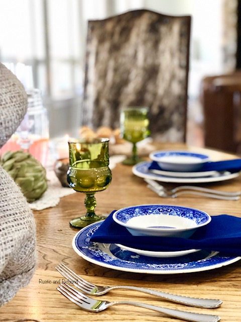 Vintage Blue and White For Brunch with green goblets on a table.
