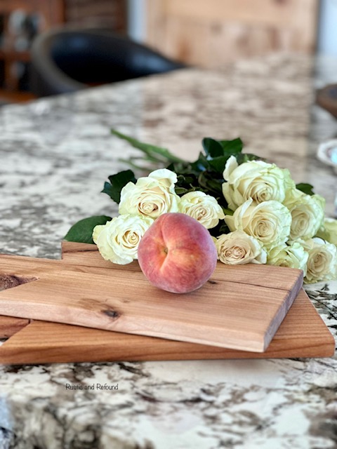 Handcrafted wood boards with peach and roses.
